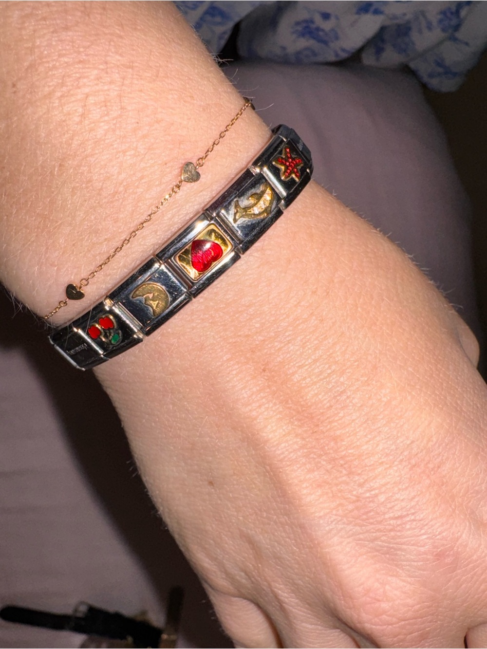 Silver nomination  bracelet with charms